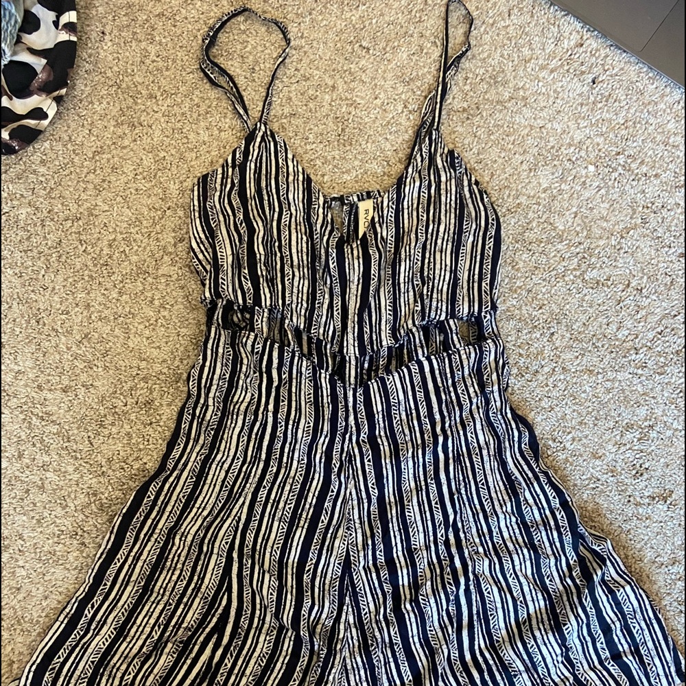 cute RVCA romper with cut out on the abdomen